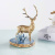 Статуэтка Благородный олень с кристаллами кианита на срезе агата
